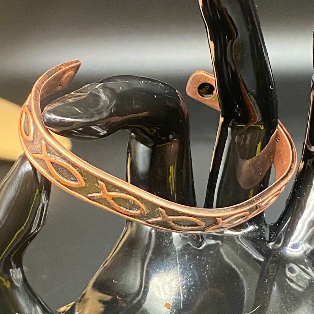 Ladies 5 1/2” 24k gold electroplated copper bracelet with the fish emblem